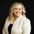 Professional headshot of attorney Kolby Warren